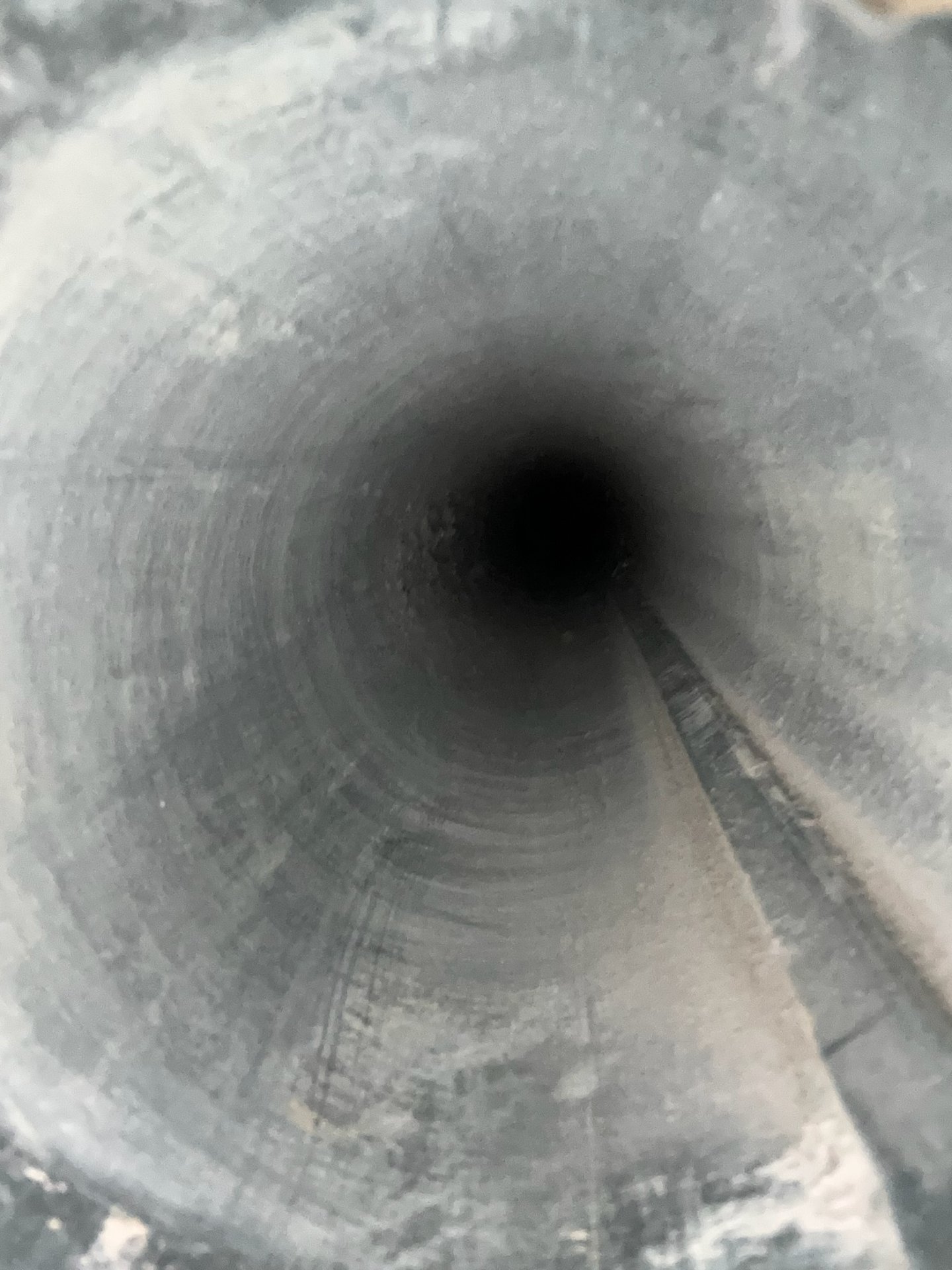 Clean dryer duct viewed from the vent opening