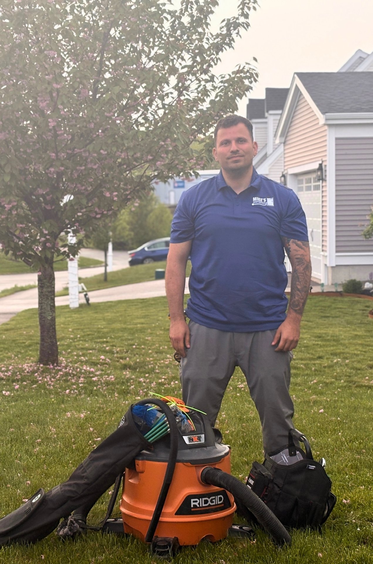 Technician on-site with cleaning equipment
